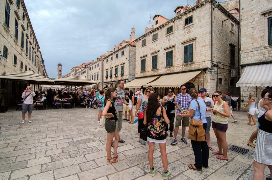 1.5-Hour Walking Tour of Dubrovnik's Old Town - Franciscan Monastery cloister: a calmer pause in the middle of town