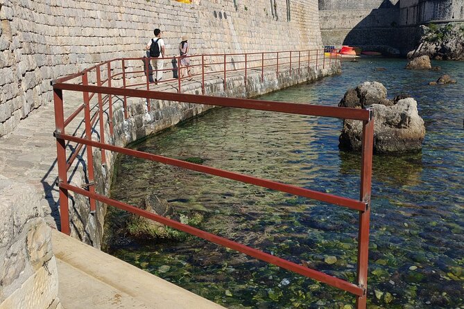 Adventure Dalmatia - Sunset Sea Kayaking & Snorkelling Dubrovnik - Paddling Back Toward Old Town as the Sunset Hits