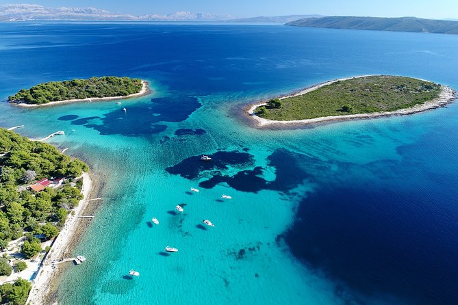 Blue Lagoon & Maslinica half day tour from Trogir - Stop 1: Blue Lagoon at Krknjasi Bay, Veliki Drvenik, and snorkeling time