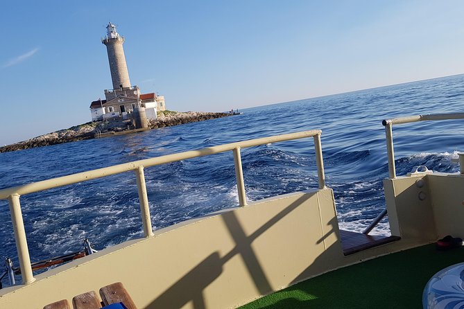 Boat tour swimming snorkeling south Istria Kamenjak Premantura - First big stops: Bay of Premantura, Cape Kamenjak, Porer lighthouse
