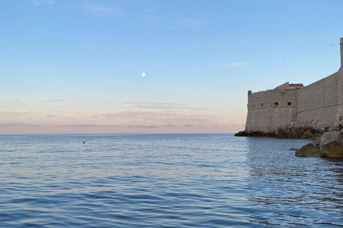 Dubrovnik 45 minute Panoramic Cruise - Stop one: Old Town harbor views, city walls, and the Buza pools