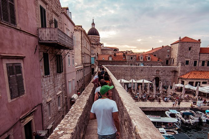 Dubrovnik: Ancient City Walls & Wars Walking Tour - Stairs, heat, audio headsets, and how to keep your pace