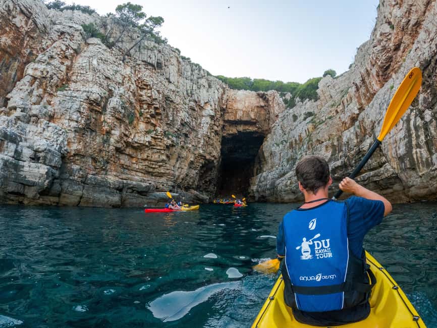 Dubrovnik: Guided Sunset Sea Kayaking Tour with Wine - Snorkeling gear and waterproof storage: small things that save your trip