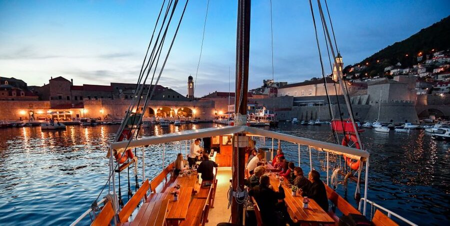 Dubrovnik: Panoramic Sunset Cocktail Cruise Around Old Town - The view from Dubrovnik’s City Walls, from a seat you can actually enjoy