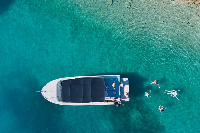 Exclusive Blue Lagoon Luxury Boat Tour from Split - Stop 1 at Krknjasi Bay: Long Anchor, Swim, and Snorkel Time
