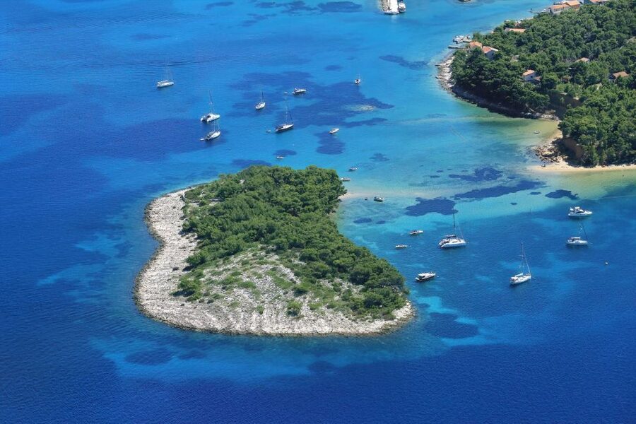 From Biograd: Golden Island of Vrgada Trip with Lunch - Vrgada’s best moment: sandy beach time and crickets