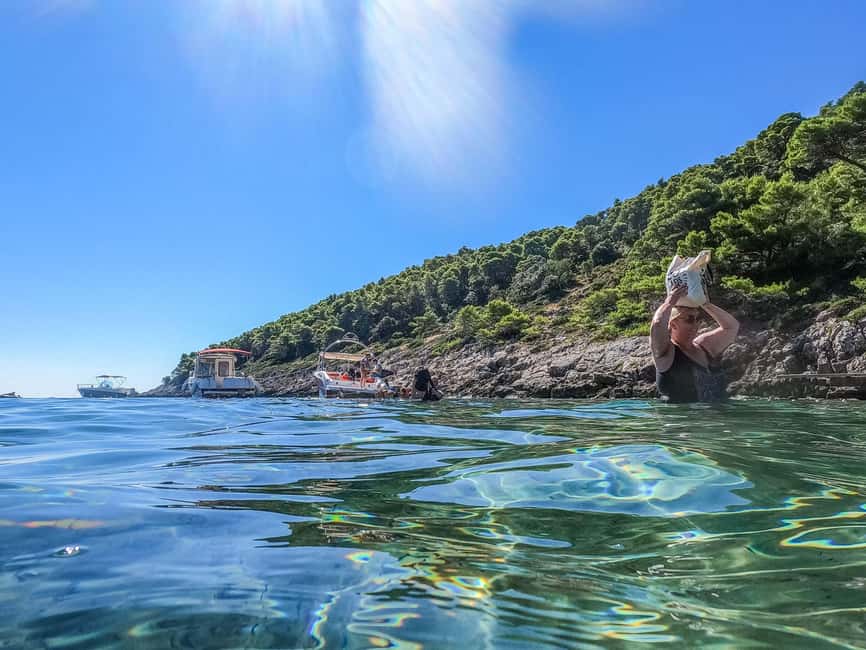 From Dubrovnik: Elaphiti Islands & Blue Cave Speedboat Tour - Getting To The Boat: Old Town Pier, Karuzo Desk, and a Timely Arrival