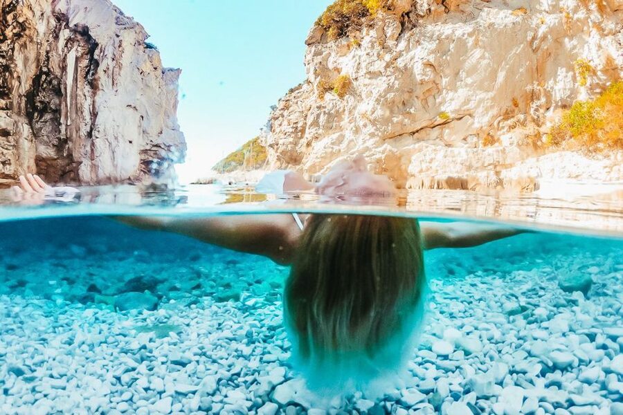 From Hvar: Blue and Green Cave Day Tour - Stiniva Cove: Jump-Off Swimming in a Hidden Pebble Bay