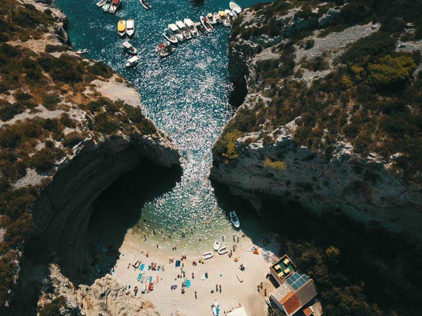 From Hvar: Vis Island and Blue Cave Speedboat Tour - Stiniva Beach on Vis: swimming in a postcard bay