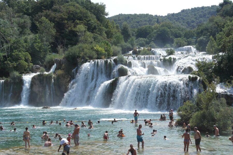 From Omiš: Krka Waterfalls and Trogir Group Tour - The Krka Canyon Boat Ride and Skradin Swim Break