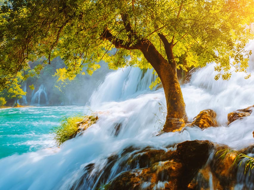 From Trogir, Seget & Okrug: Krka Waterfalls & Swimming - Skradin waterfront and the river-meets-sea swim