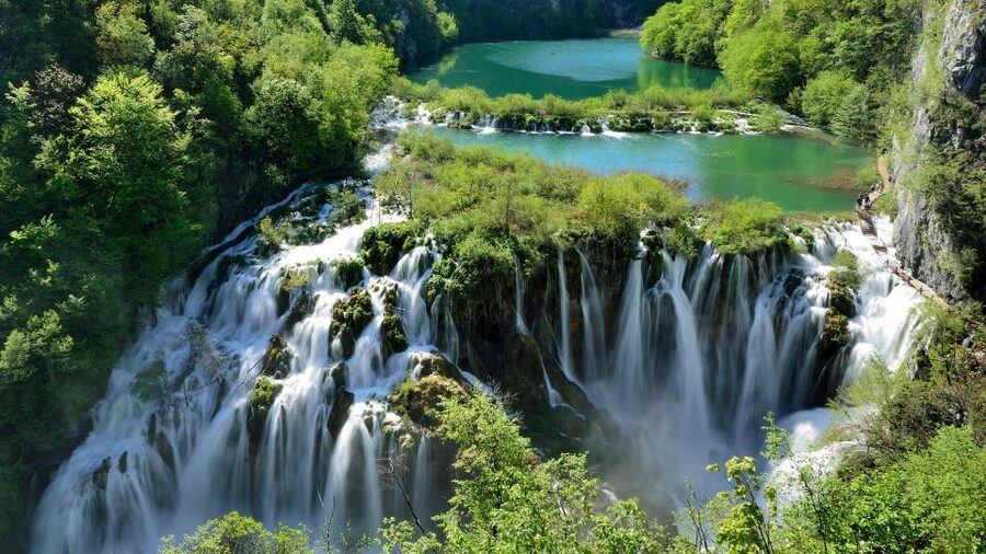 From Zadar: Plitvice Lakes National Park Tour - The road trip logistics: pickups, A/C bus, and realistic timing