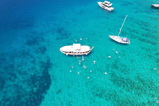Full Day Boat Tour, Blue Lagoon and Šolta with lunch&drinks - Čiovo peninsula views while the boat heads toward Krknjasi Bay