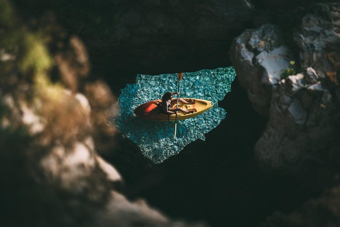 Kayak tour with cave experience - Cliff jumping and rocky walking: fun factor with a practical edge