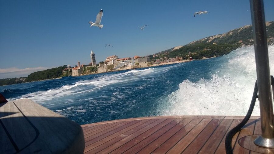 Krk:Rab & Pag Boat Trip with Swimming & City Tour with lunch - Rab old town tour: walls, bell towers, and a beach underneath