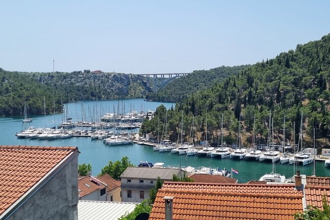Krka Waterfalls Afternoon Tour, Included Entrance Fee and Guide - Returning to Zadar at Fosa the Land Gate: convenient ending