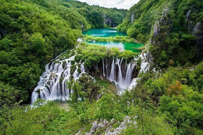 Ljubljana, Postojna Cave and Predjama Castle Day Tour from Zagreb - Postojna Cave Park: the train ride, the formations, and staying warm