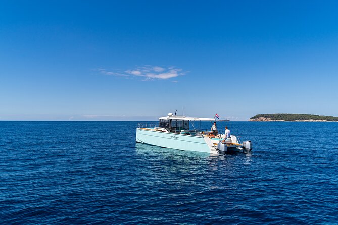 Luxury Blue Cave and Elaphiti Islands Small Group Tour - Šunj Beach on Lopud: The Long Sandy Stop, Plus the Swim-to-Shore Detail