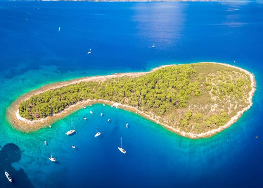 Makarska: 3 island, Cave, Cliffs, Jelsa, Lagoon, Golden Horn - Bonus Brač cove stop: quiet swim, a beach swing, and dolphin chances