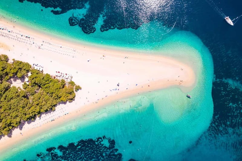 Makarska: 3-Island Speedboat Golden Horn & Blue Lagoon Tour - Nugal Beach by the cliffs: a fast photo stop that sets the tone