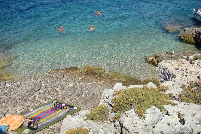 Medulin -Kamenjak 5h boat trip with lunch & drinks on Sandra Boat - Lunch on board with wine, beer, and a real menu choice