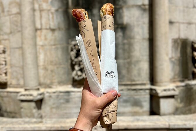 Old Town Dubrovnik Food Tour of 10+ Authentic Croatian Tastings - Stop 5 at Boškovićeva ul. 15: black risotto and meat ragu macaroni with local red