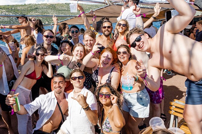 Out to Sea Split Boat Party w/ Blue Lagoon Swim, Dj & Afterparty - Top deck time: DJ energy, sea views, and making friends fast