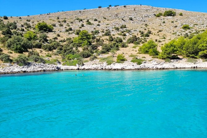 Private Full Day Tour | Food & Drinks | Kornati or Vrgada - Stop 3: Mana Cove, 80-meter cliffs, and the film connection