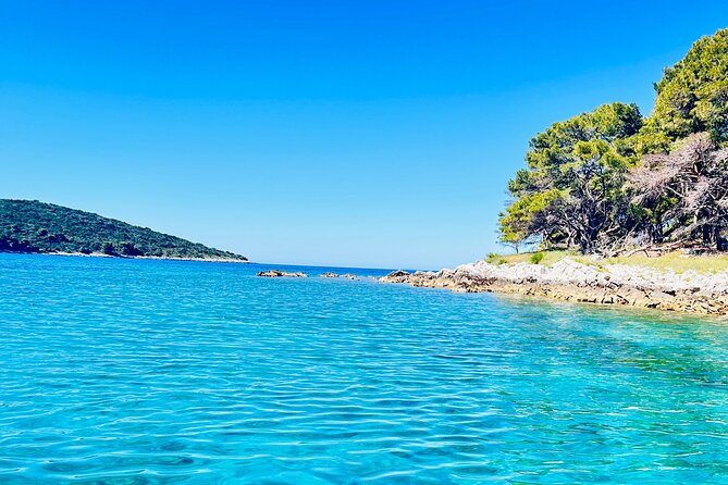 Private Half-Day Boat Tour from Split: Blue Lagoon & 2 Islands - Stop 1: Blue Lagoon and Krknjasi Bay, the Main Swim Hour