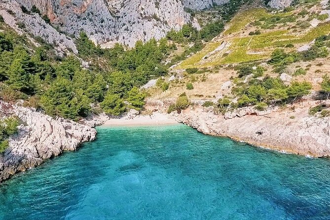 Private Tour of Red rocks, Pakleni Islands and Hvar's Southern Beaches - Stop 1, Red Rocks of Hvar: cliff views, caves, and real snorkeling time