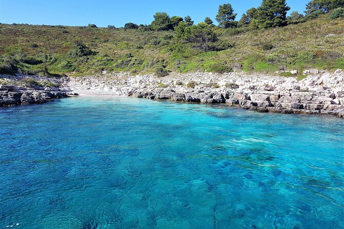 Private Tour of Red rocks, Pakleni Islands and Hvar's Southern Beaches - Stop 3, Dubovica Beach: larger beach vibes, a bar, and a cave option