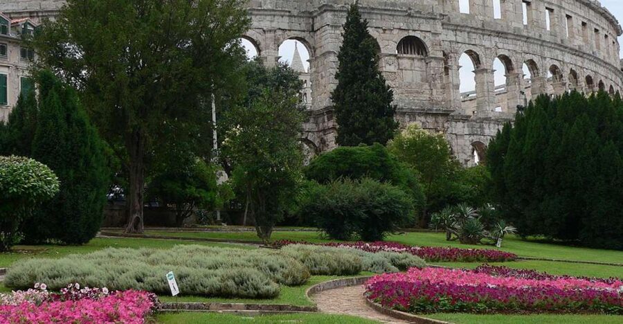 Pula: Historic Walking Tour with Local Guide & City Views - Entering the Roman Amphitheatre: More Than Gladiators
