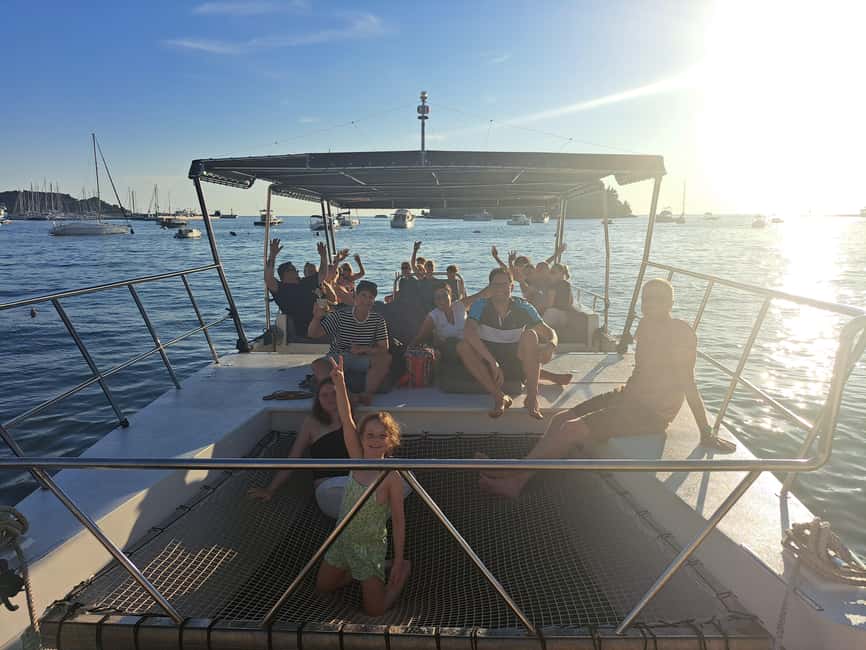 Rovinj: Sunset & dolphin group tours with Catamaran - Old Town and Harbor Views at the End: The Reward for Waiting for the Light