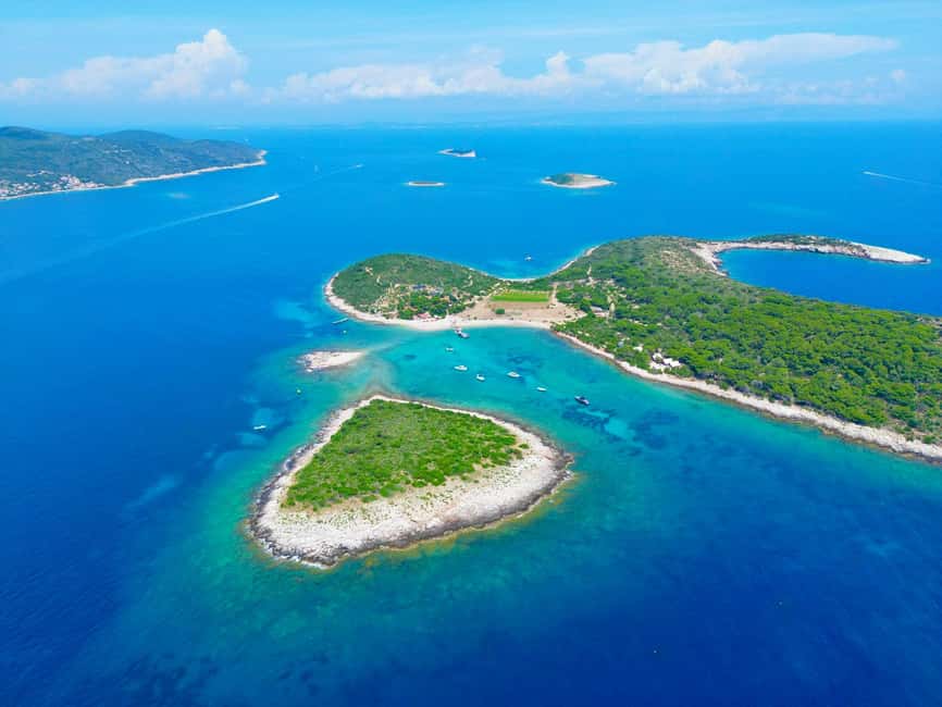 Split: Blue Lagoon & 3 Island Cruise with Snorkeling - Onboard vibe: wind jackets, wine, and crews that keep energy high