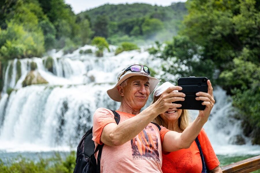 Split: Krka National Park Day Trip with Boat Ride & Swimming - Getting the Boat Right: Scenic Canyon Views to Skradin