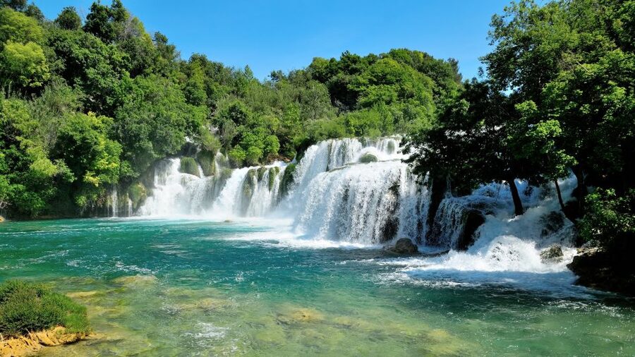 Split: Krka National Park Day Trip with Boat Ride & Swimming - Skradin Beach Time: Swimming, Pebbles, and a Small-Town Walk