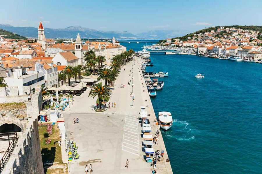 Split/Trogir: Blue Lagoon and 3 Islands Speedboat Tour - The Blue Lagoon stop: snorkeling gear, sun time, and the dolphin odds