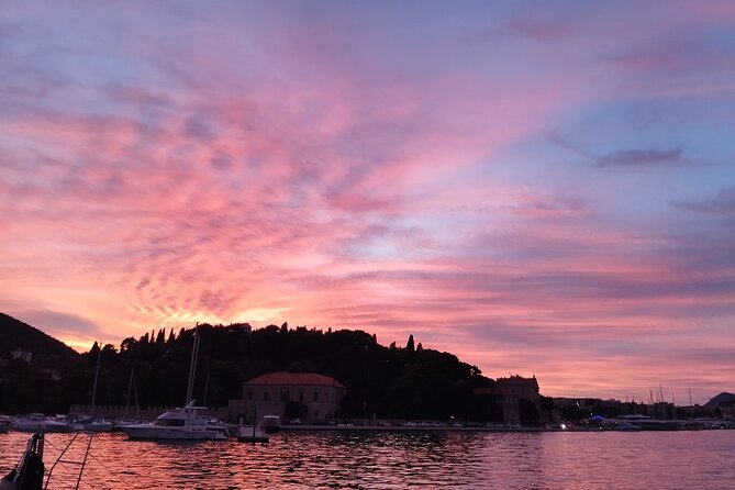 Sunset Catamaran Tour from Old Town Dubrovnik - Onboard vibe: sparkling wine, music, and photos that actually help