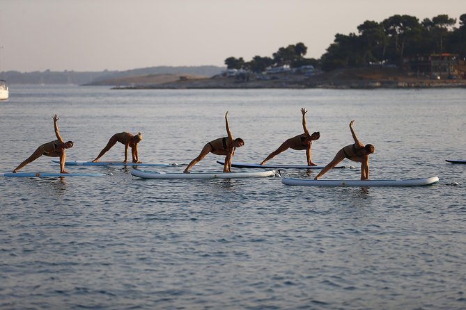 SUP Yoga in Pula: Flow on Water - 150m offshore: close enough to feel safe, far enough to feel free