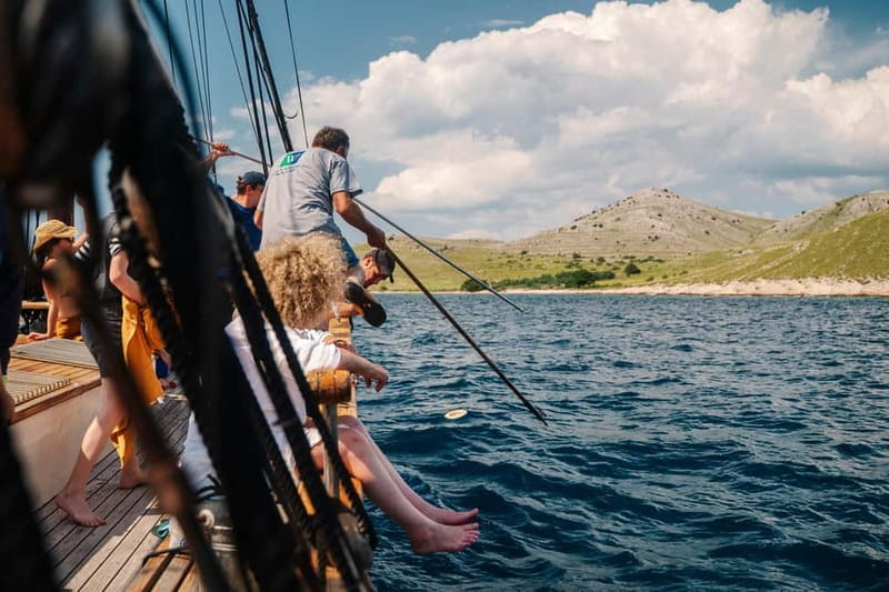 Zadar: Boat Tour with Unlimited Wine & 3 Stops - Hidden Bay anchor stop: snorkeling, lounging, and weather-dependent anchoring