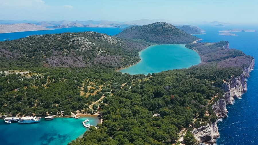 Zadar: Kornati Boat Trip with Lunch and Swim Stops - Back on Board: Water, Wine Refills, and the Return to Zadar