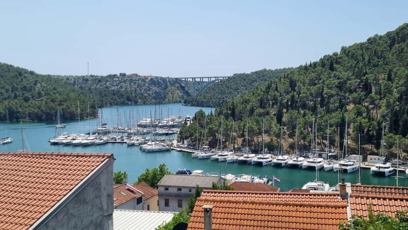 Zadar: Krka Waterfalls Tour, Boat Cruise & Swimming - Skradin Beach Time: swimming, shade, and a slower pace