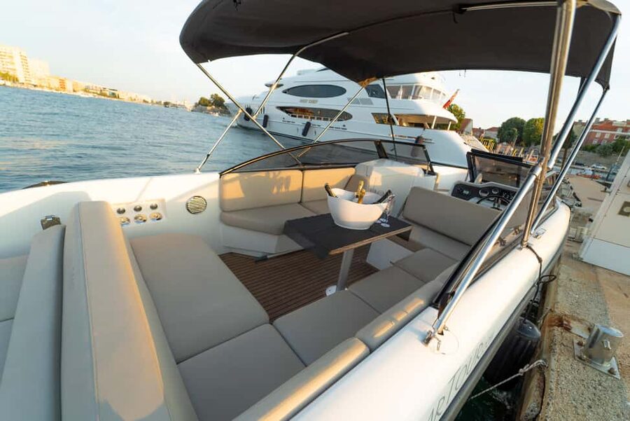 Zadar: Sunset and Night Cruise with Unlimited Sparkling Wine - Zadar’s Old Town walls and Lion Gate from the water